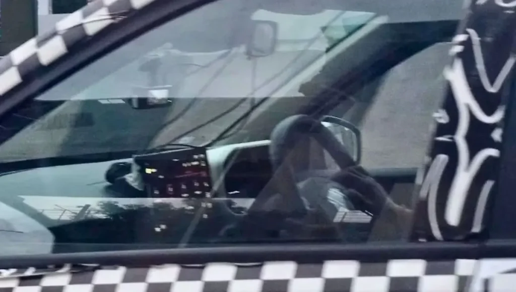 Renault Kwid Facelift interior with large touchscreen and digital instrument cluster