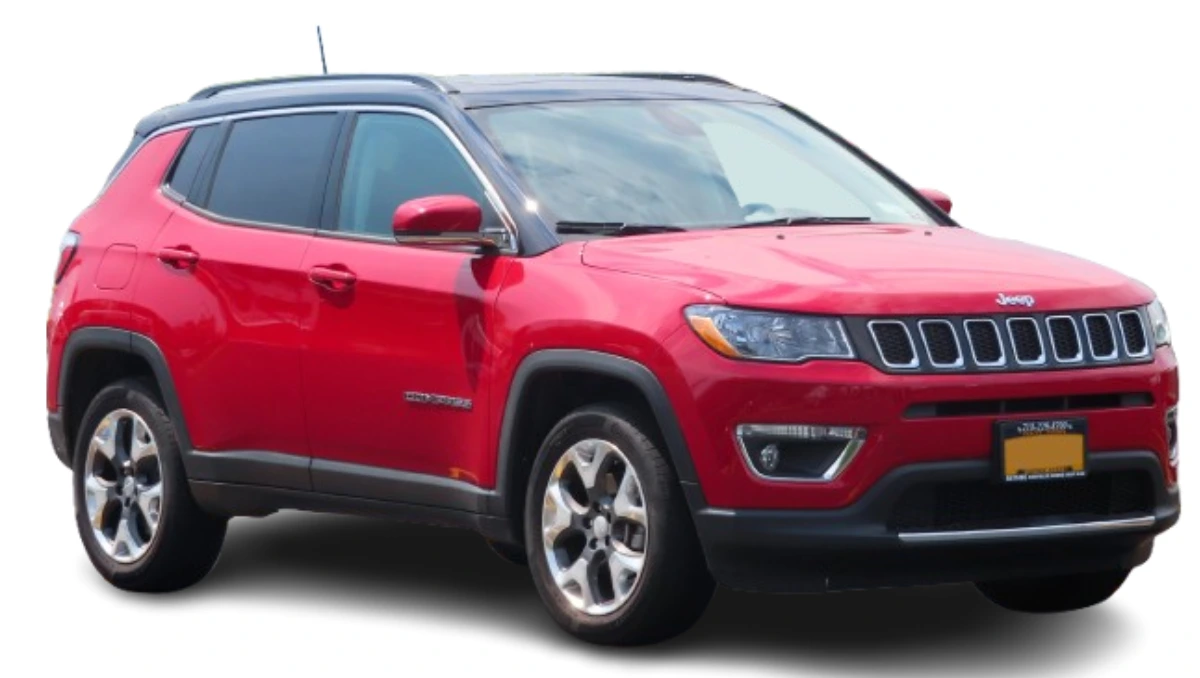 Jeep vehicles parked at a dealer recall service area