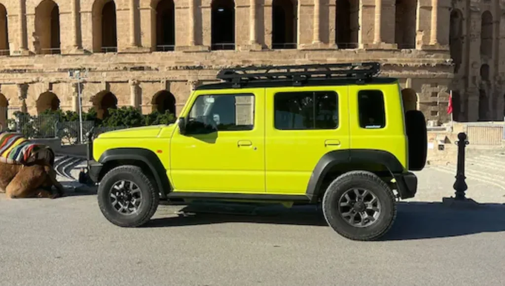 Maruti Suzuki Jimny 5-door showcasing off-road capability in rugged terrain