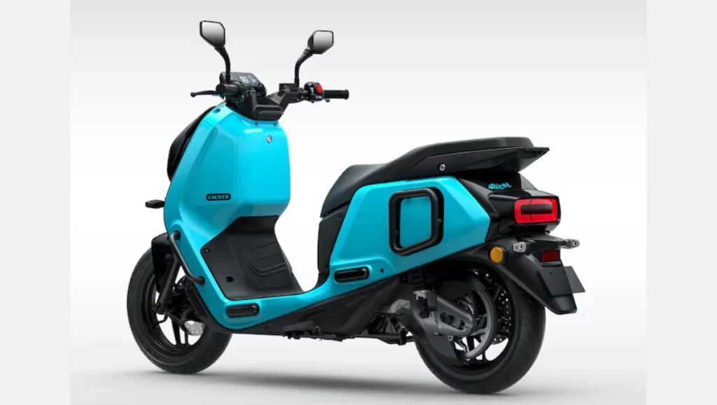 Rear view of the River Indie electric scooter showing the 'Frosted-Tube' LED taillight and utility features.