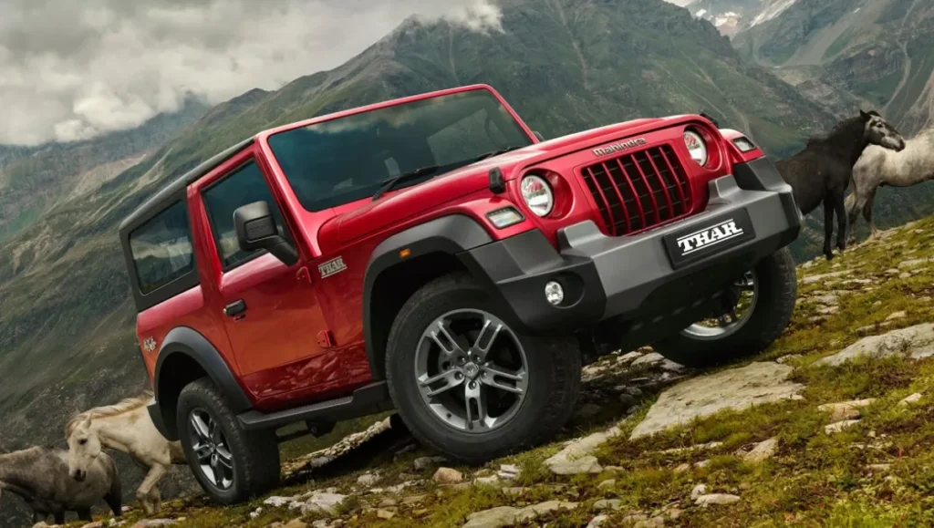 2025 Mahindra Thar Facelift parked in an off-road terrain