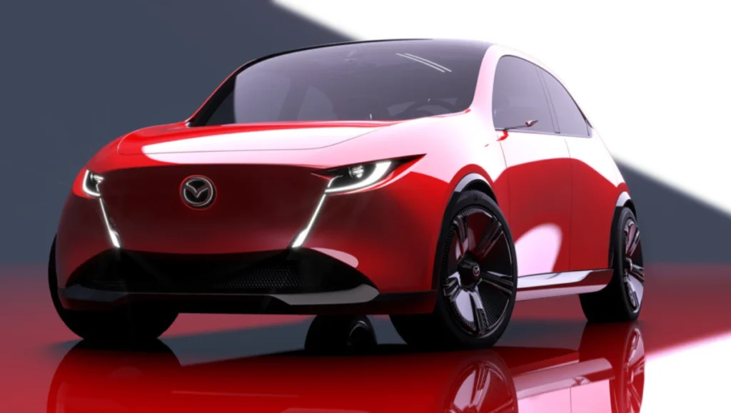 Mazda Vision X-Compact front view with sharp LED lights and red exterior