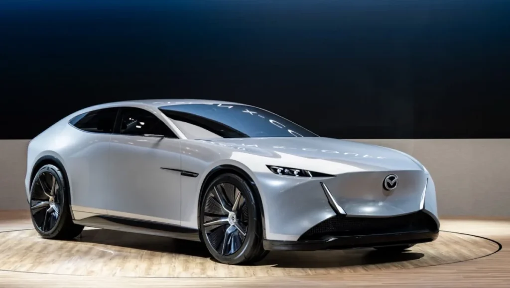 Mazda Vision X-Coupe front view with sleek LED headlights and aerodynamic body
