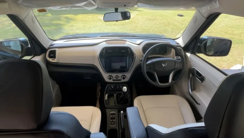 2025 Mahindra Bolero Neo interior with 9-inch touchscreen and dual-tone cabin