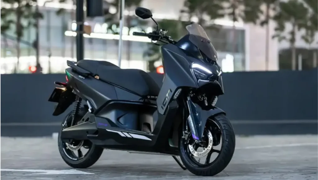 Side view of the 2026 TVS M1-S Electric Maxi-Scooter showing stepped seat and alloy wheels
