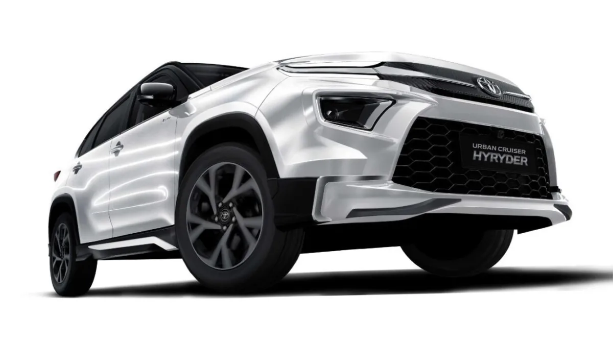 Toyota Urban Cruiser Hyryder Aero Edition front and side view with sporty Aero body kit including front spoiler, side skirts, and rear spoiler in red colour