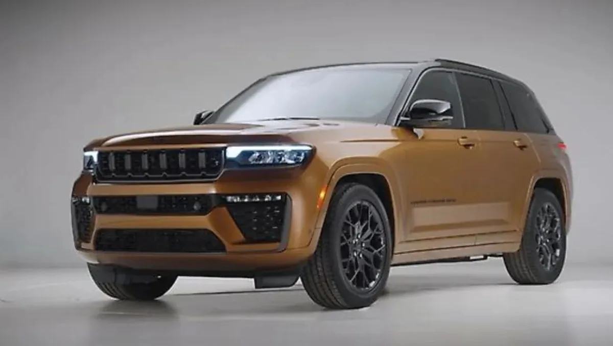 2026 Jeep Grand Cherokee SUV front view in Copper Shino color