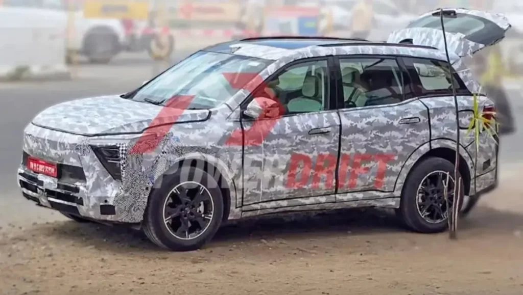 Mahindra XEV 9S 7-seater electric SUV spied testing with camouflage wrap