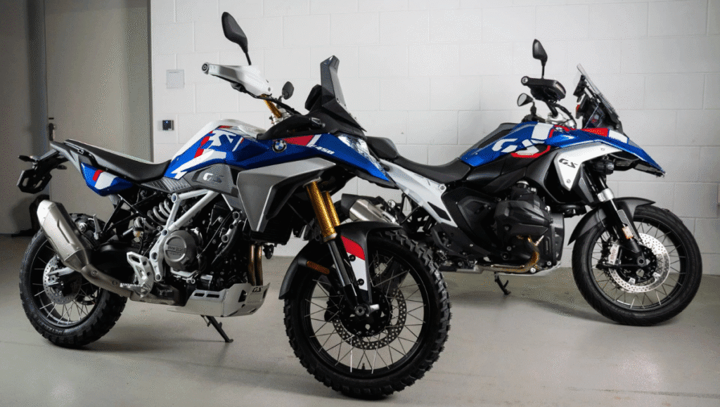 BMW F 450 GS production begins in India bike displayed alongside BMW adventure motorcycles in showroom setting