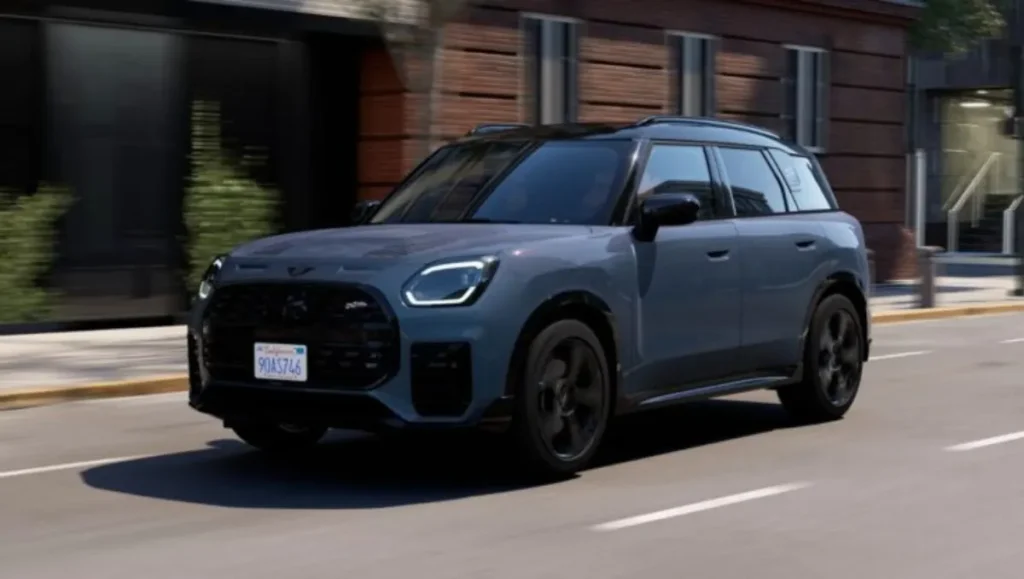 Mini Countryman SE All4 electric SUV driving on city street in India
