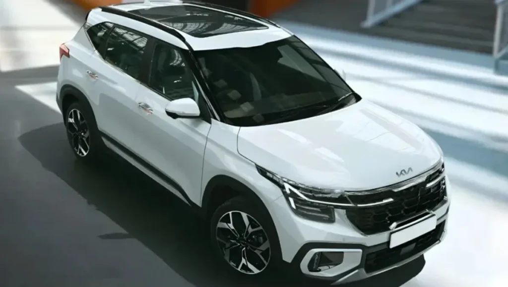 Kia Seltos top view showing sunroof, alloy wheels and modern exterior design