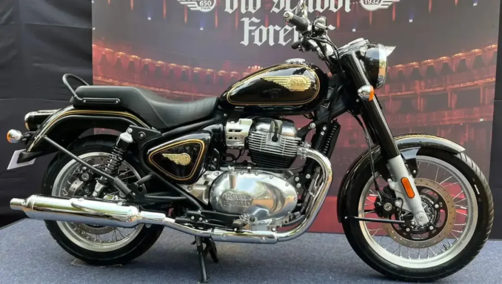 Royal Enfield Bullet 650 motorcycle showcased in black and gold with classic spoke wheels