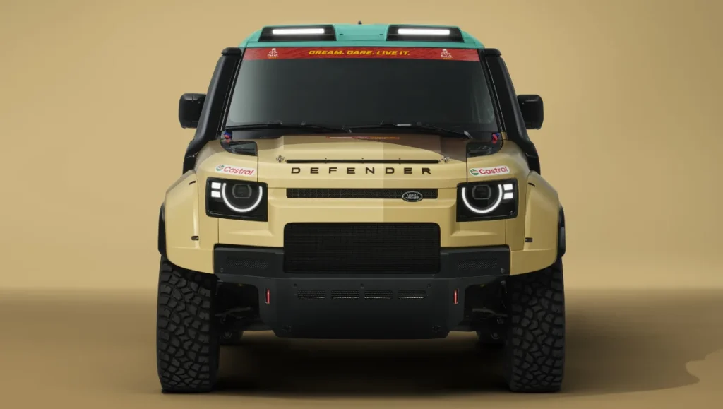 Land Rover Unveiled Dakar Rally Defender front view with rally lights and desert specification