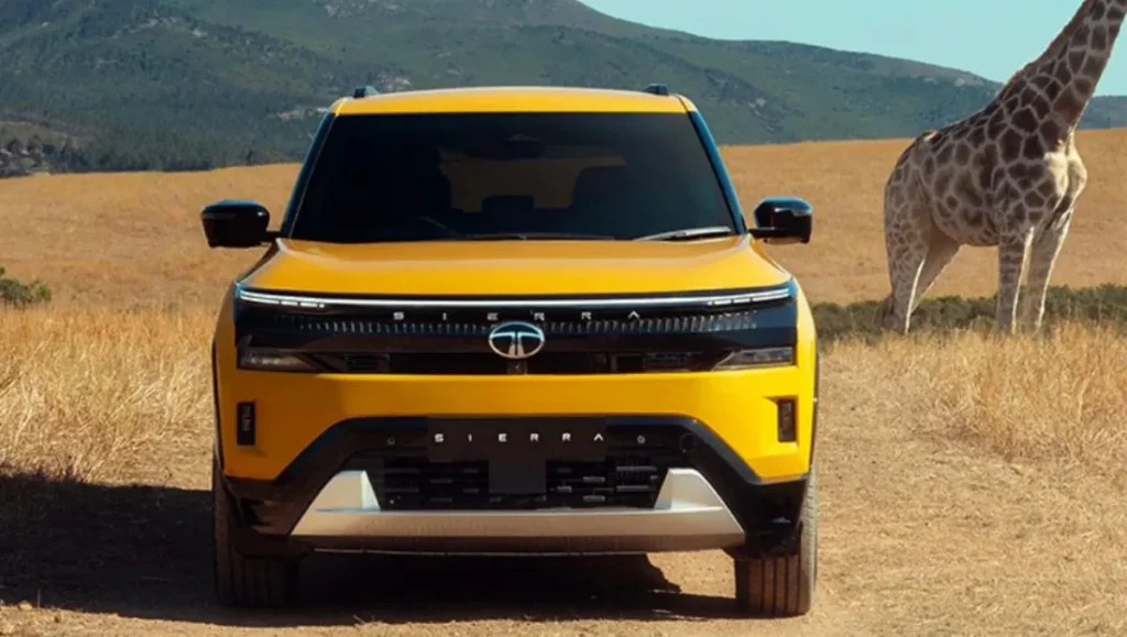Front view of Tata Sierra AWD to be launched in 2027 SUV in yellow color on safari track