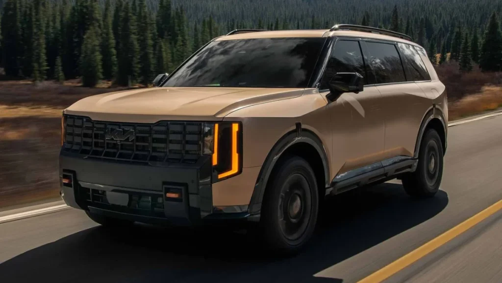 2027 Kia Telluride front driving view with redesigned grille and LED lights