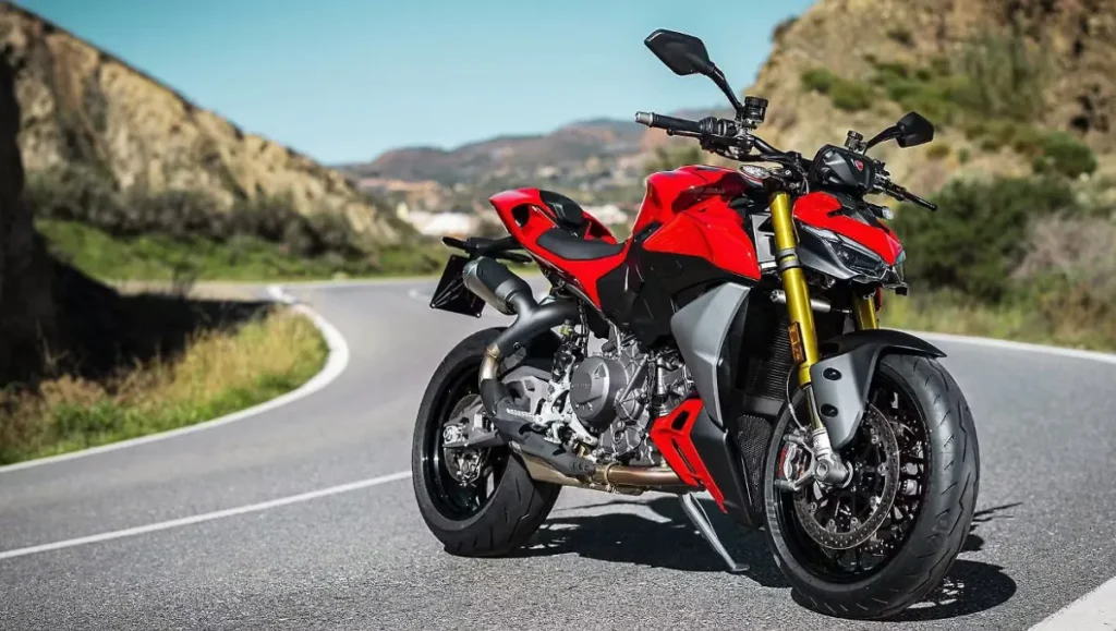 Red sport motorcycle on mountain road showing 2025 Ducati Streetfighter V2 Launched in India