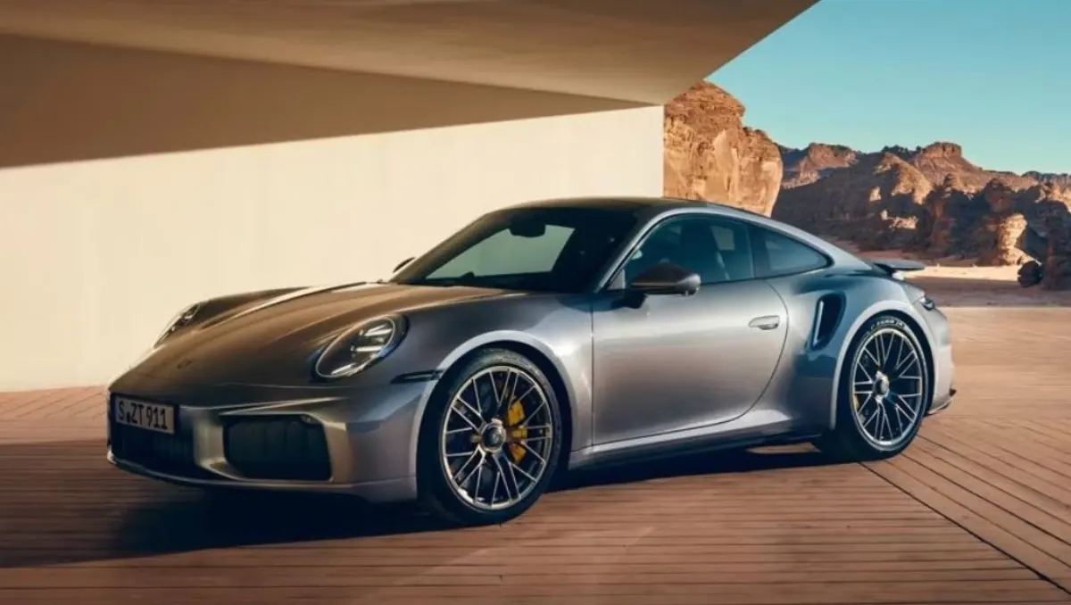 2025 Porsche 911 Turbo S Launched in India silver supercar parked outdoors