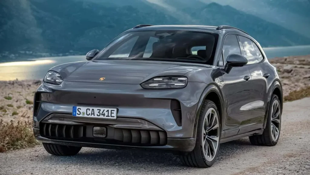 Porsche Cayenne Electric Launched front view on mountain road with modern electric SUV design