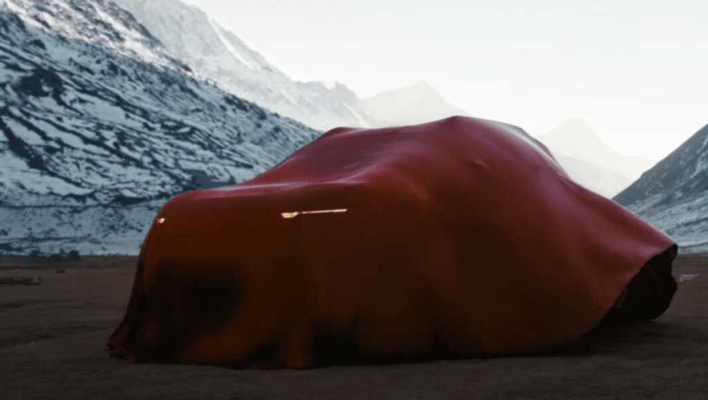New Renault Duster teased ahead of India debut partially revealed under cover with slim lighting details in mountainous setting
