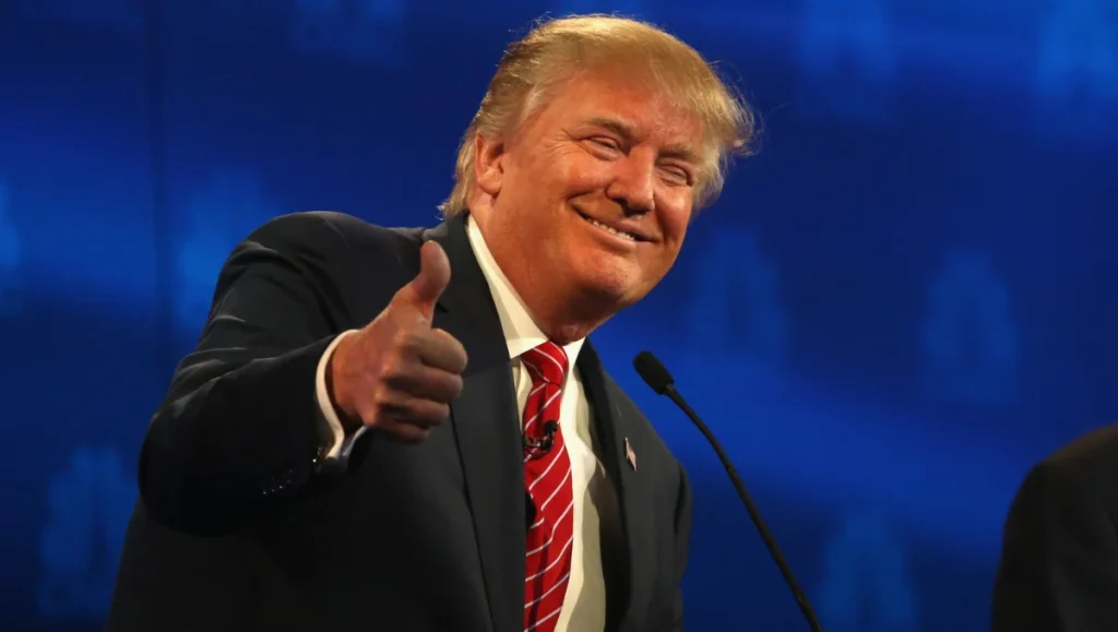 Trump Approves Tiny cars to be built in America image showing Donald Trump giving a thumbs up