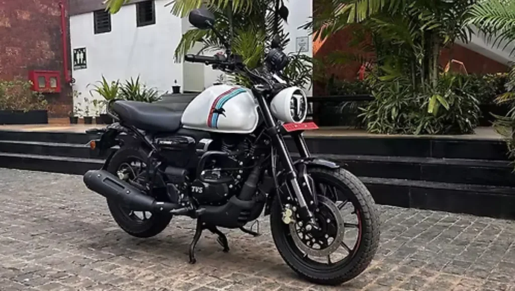 TVS Ronin Agonda Launched At MotoSoul 5.0 parked outdoors showing white tank, retro stripes and modern roadster stance