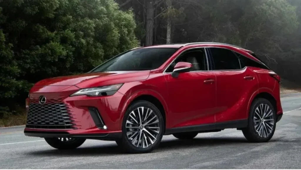 Lexus RX 350h Exquisite trim launched shown in red parked near forest road