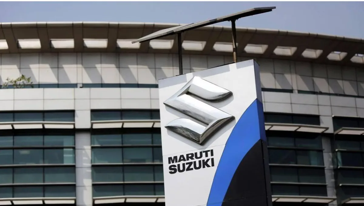 Maruti hits back at rivals over CAFE norms image showing maruti suzuki headquarters building sign