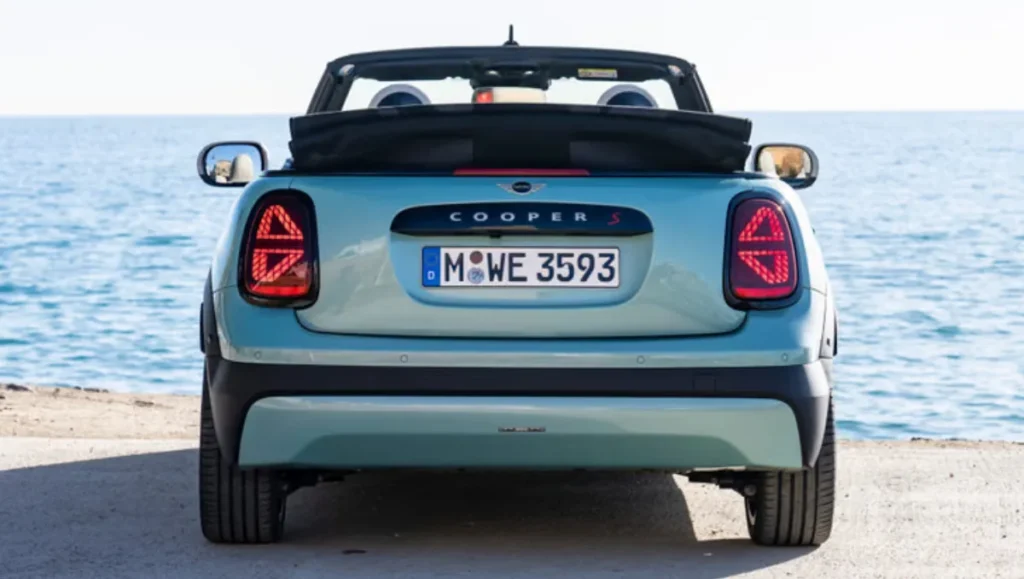 New Mini Cooper S Convertible launched rear view showing taillights and folded soft top