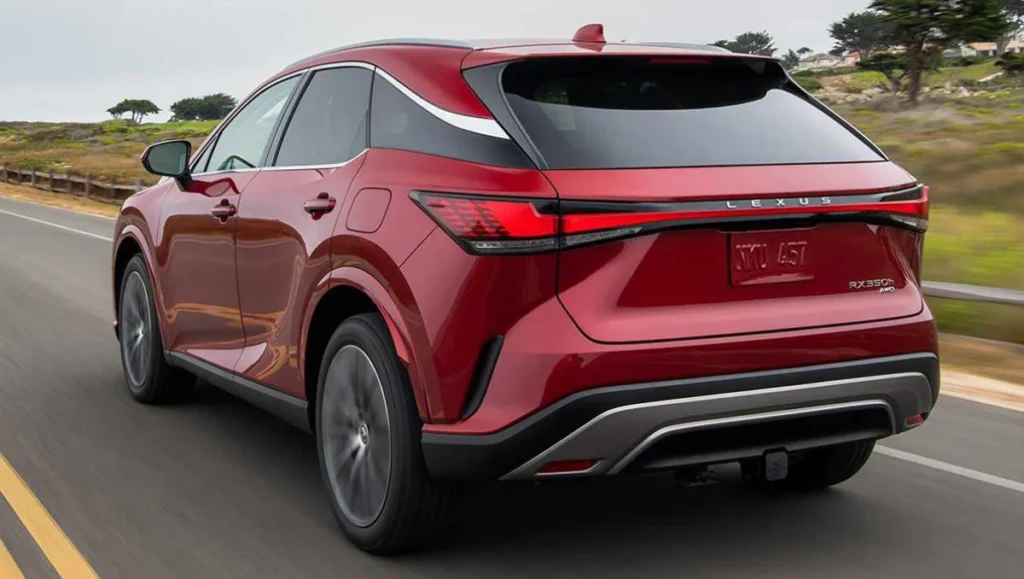 Lexus RX 350h Exquisite trim launched seen from the rear while driving on an open road