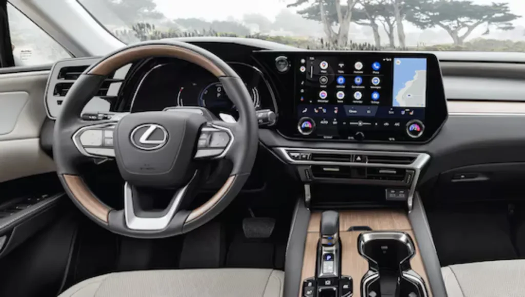 Lexus RX 350h Exquisite trim launched interior showing steering wheel and touchscreen