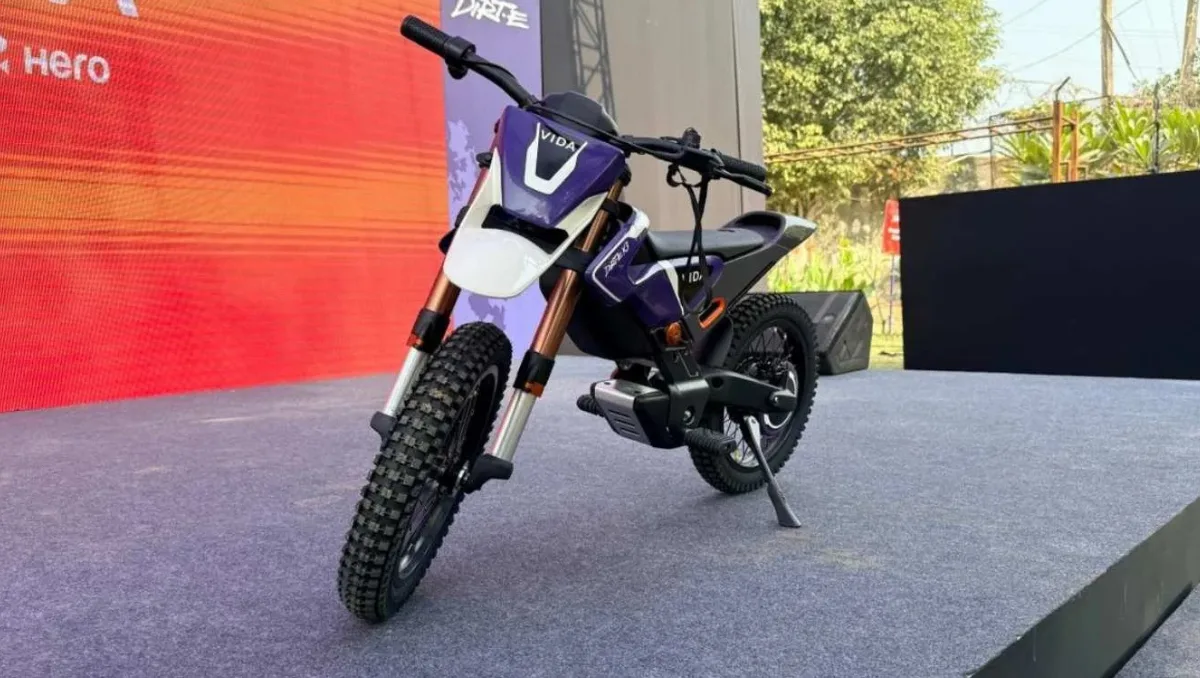 Vida launches Dirt.E K3 kids e-bike displayed on stage showing off road design, knobby tyres and compact electric dirt bike proportions for children