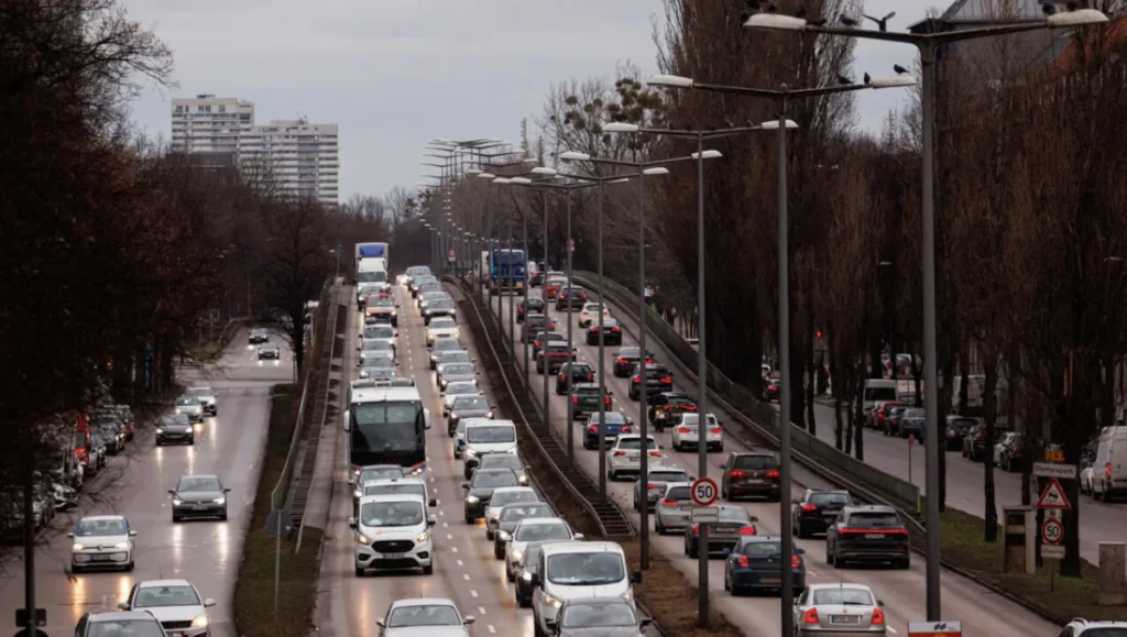 Europe Signals Possible U Turn On 2035 ICE Ban as traffic flows through a major European city, highlighting the ongoing role of combustion-engine vehicles in daily transport