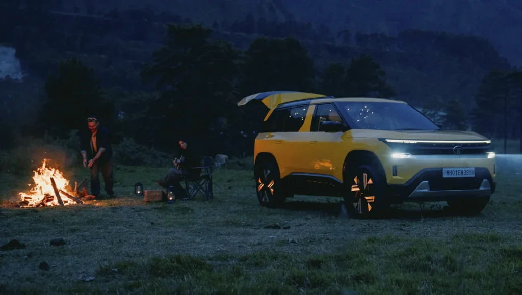 Tata Sierra Records 70K Bookings on Day 1 as the SUV is showcased during an outdoor lifestyle setting highlighting its rugged appeal