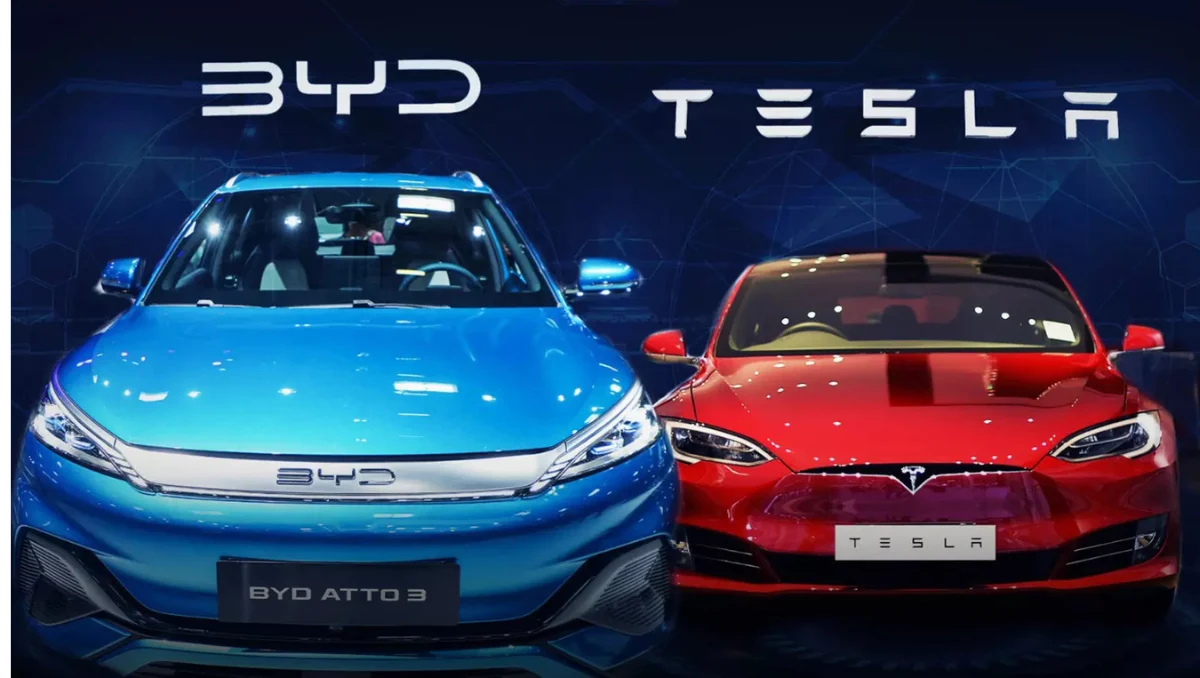 BYD overtakes Tesla in Global EV Race as BYD Atto 3 and Tesla electric car appear side by side highlighting the shift in global EV leadership