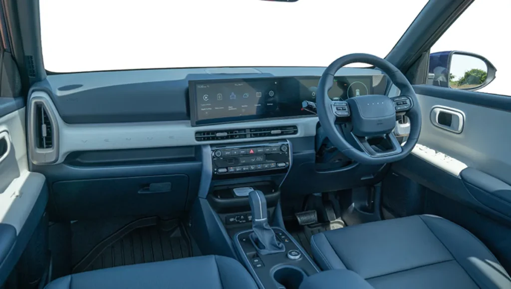 Hyundai Venue HX 5 Plus Variant Launched interior dashboard showing touchscreen infotainment and steering layout
