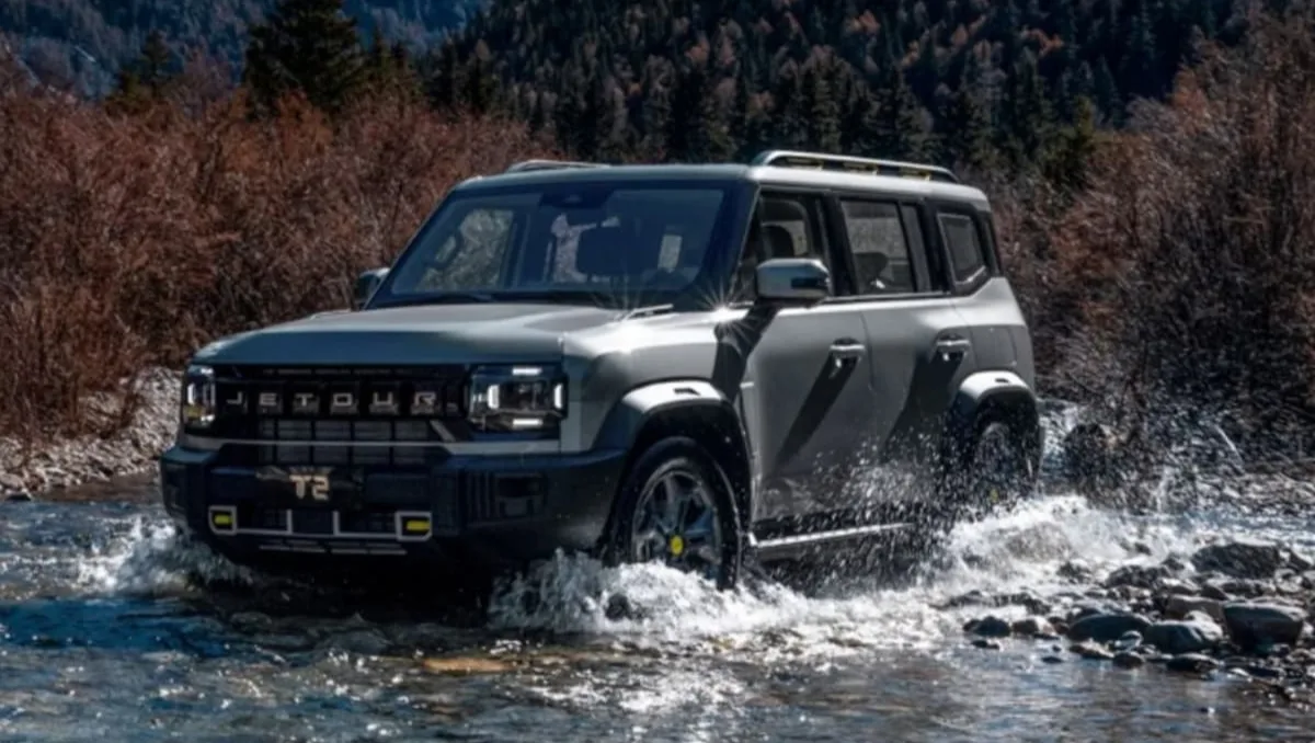 JSW Motors to Launch Plug-in Hybrid SUV in June showcased through rugged SUV driving through water