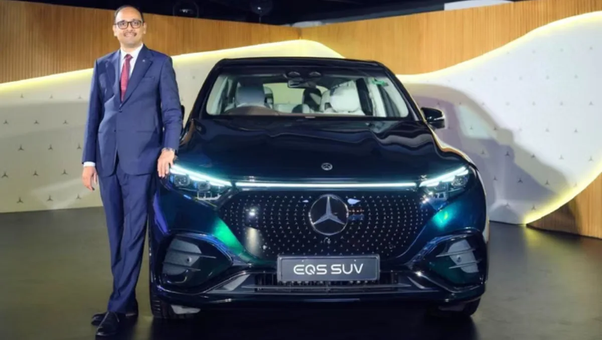 Front view of the new Mercedes-Benz EQS SUV Celebration Edition Launched in India showcasing the AMG Line styling and 21-inch wheels.