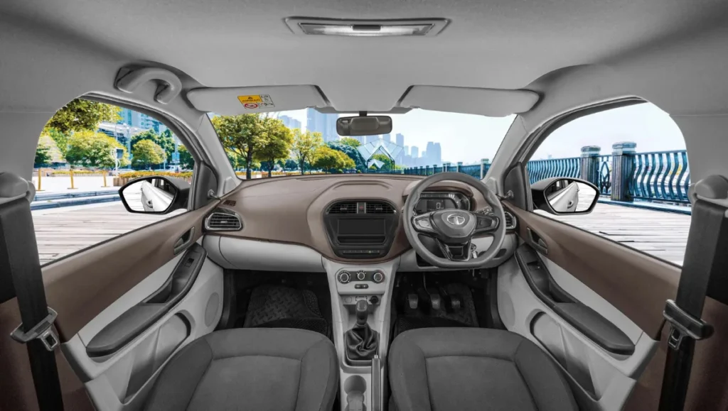 Tata Launches Fleet-Only XPres Petrol And CNG Variants interior showing dashboard layout, steering wheel and manual controls