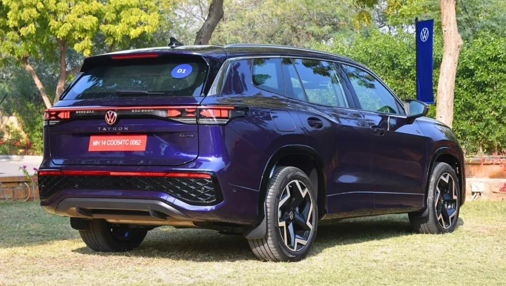 Volkswagen Tayron R-Line Unveiled in India rear three quarter view showing LED tail lamps and wide stance