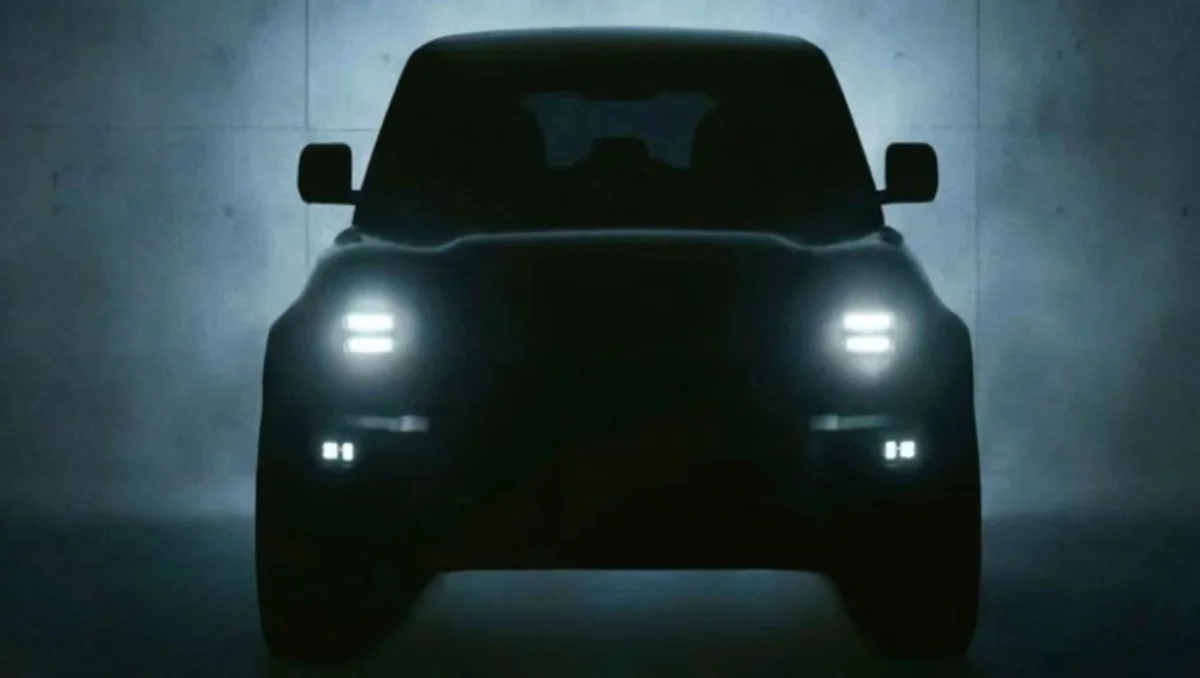 JSW Motors Teases Rugged Jetour T2 SUV front teaser silhouette with LED headlamps illuminated