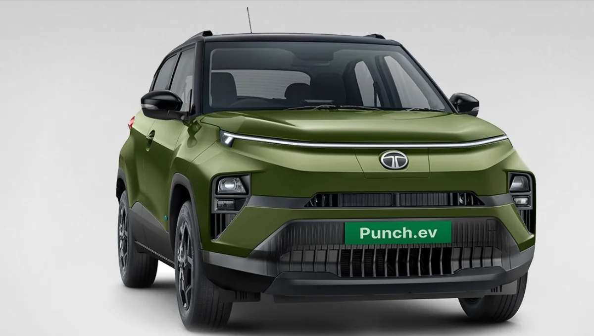 Tata Punch.ev Facelift Launching Feb 20 shown in studio front view with green exterior and EV styling