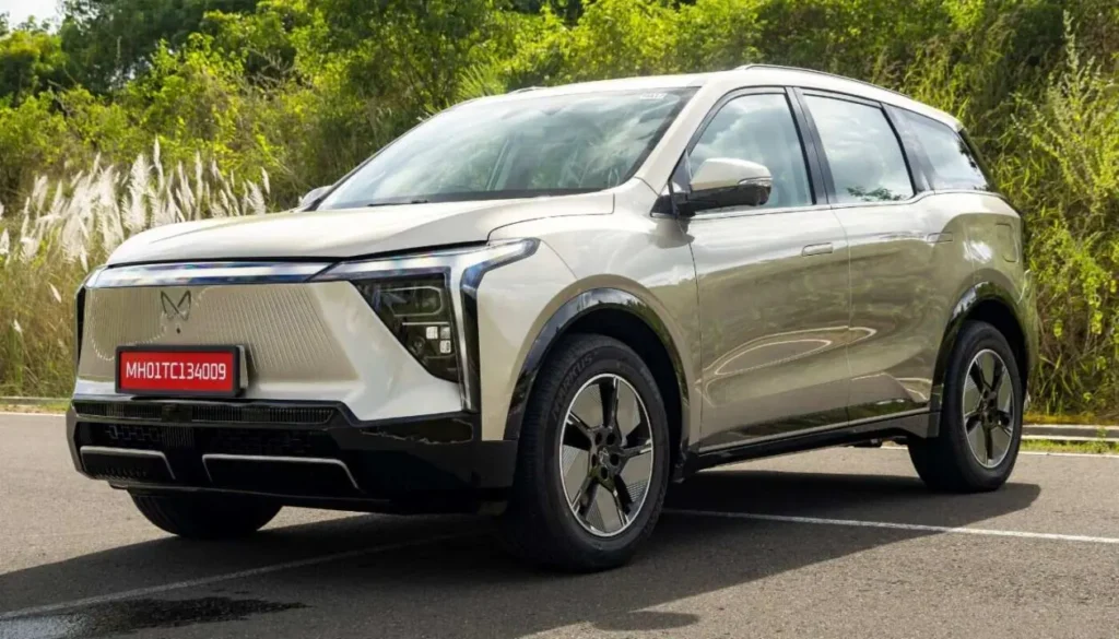 Mahindra EV Range Gets BaaS: Starts At ₹11.45 Lakh - Front three-quarter view of the champagne gold Mahindra XEV 9S electric SUV