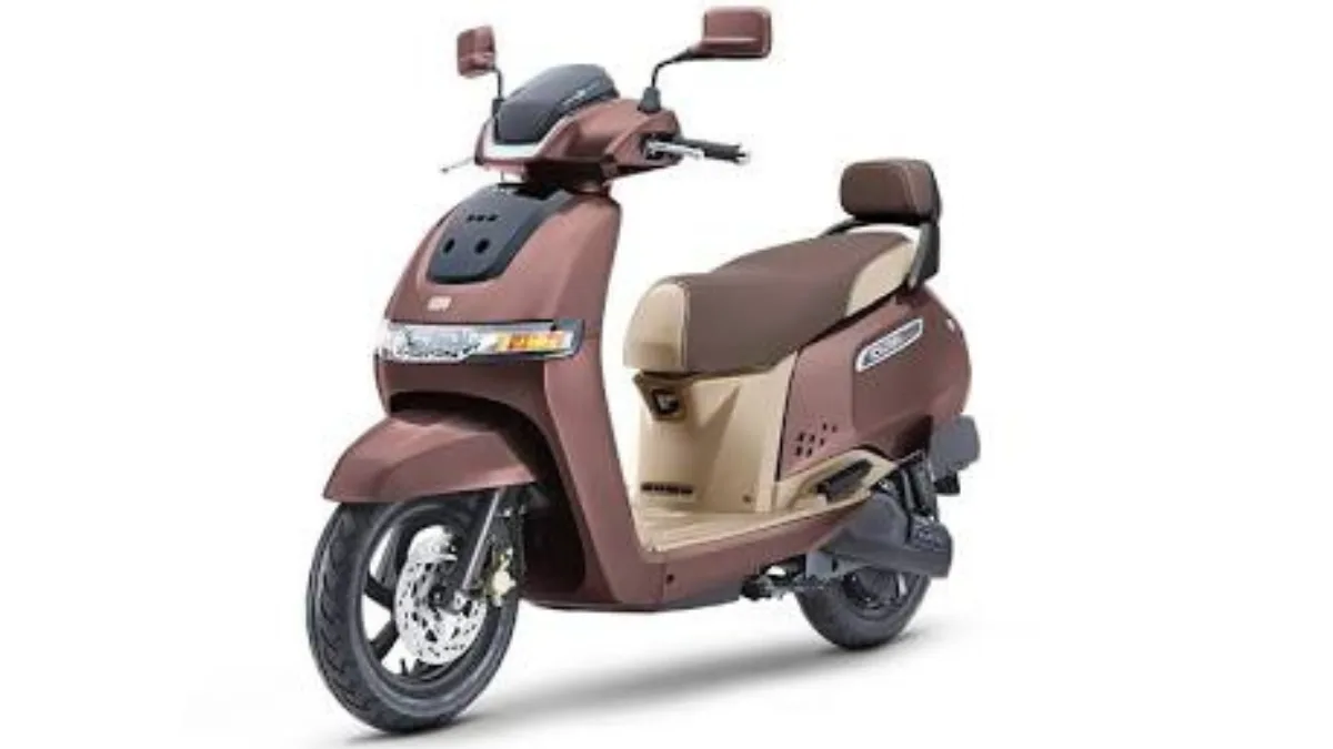 TVS Beats Ola as India's #1 Electric 2W Brand: 2026 Sales Data showing the brown TVS iQube electric scooter model.